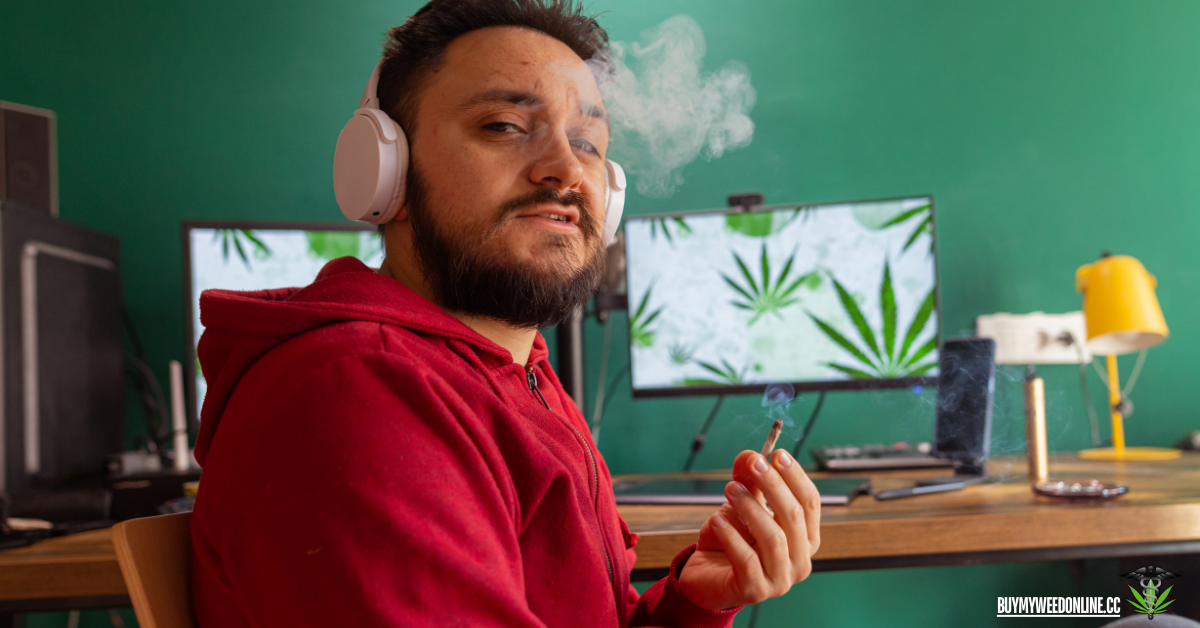 person smoking weed with a red jacket that's looking right through the camera